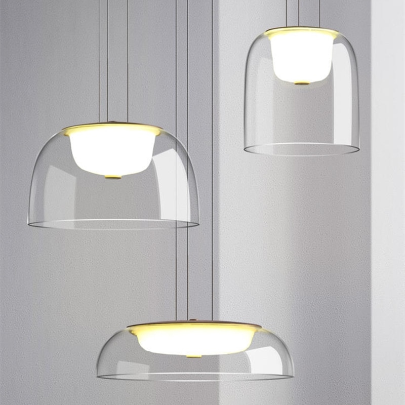 Como escolher o pendente ideal para a sala de jantar? Conheça diferentes modelos e estilos para compor sua mesa. 7 Lumin ria pendente minimalista em vidro claro lustre moderno em ferro sala de jantar cozinha suspensa luminaires YustDesign Chandeliers and wall lights on sale and cheap